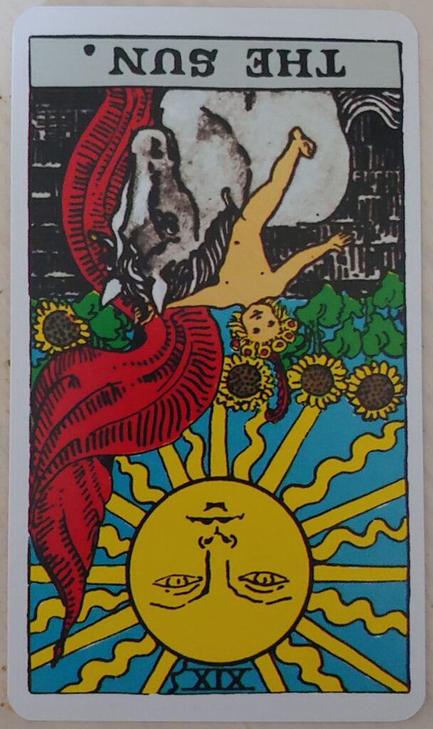 The Sun card, reversed