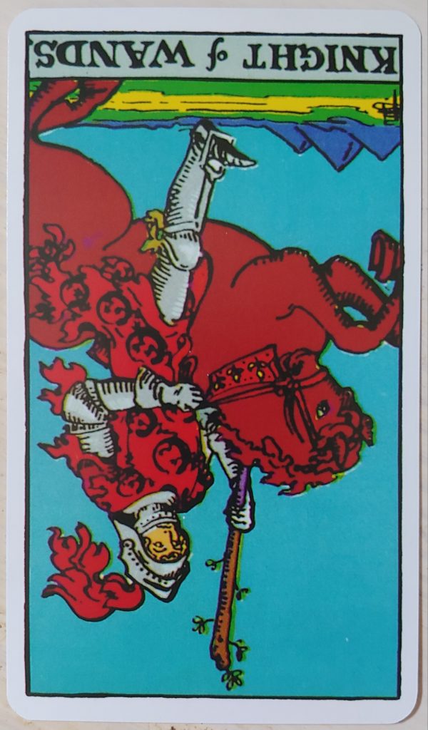 Knight of Wands card, reversed